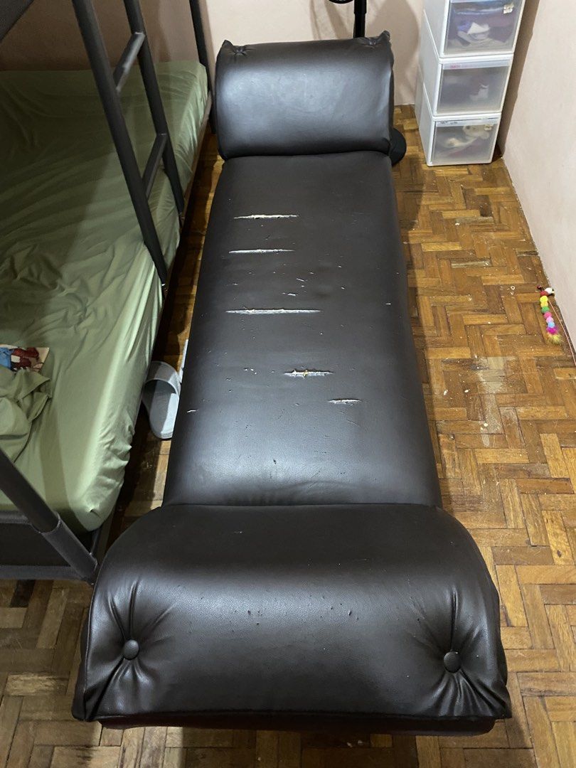 Brown Sofa with Armrests (Category: Sofas) located in Las Pinas. Submitted by tigergemini (Listing ID 1438834534, Image 3). Description: - Brown sofa with armrests - Features a long, cushioned seat - Visible scratches on the surface - Comfortable seating option - Suitable for lounging.