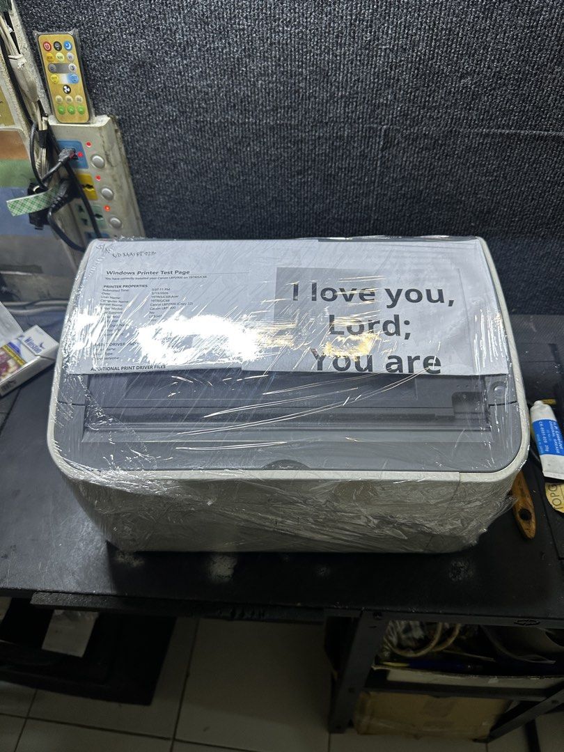 Canon LBP2900 Laser Printer (Category: Printers, Scanners & Copiers) located in Makati City. Submitted by jtechs (Listing ID 1438729948, Image 2). Description: - Canon LBP2900 laser printer - Color: White - Features Canon logo - Includes Windows printer test page - in good running condition with usb cord power cord.