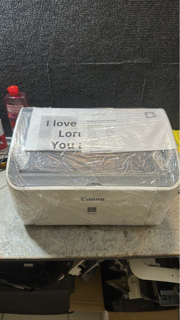Canon LBP2900 Laser Printer (Category: Printers, Scanners & Copiers) located in Makati City. Submitted by jtechs (Listing ID 1438729948, Image 1). Description: - Canon LBP2900 laser printer - Color: White - Features Canon logo - Includes Windows printer test page - in good running condition with usb cord power cord.