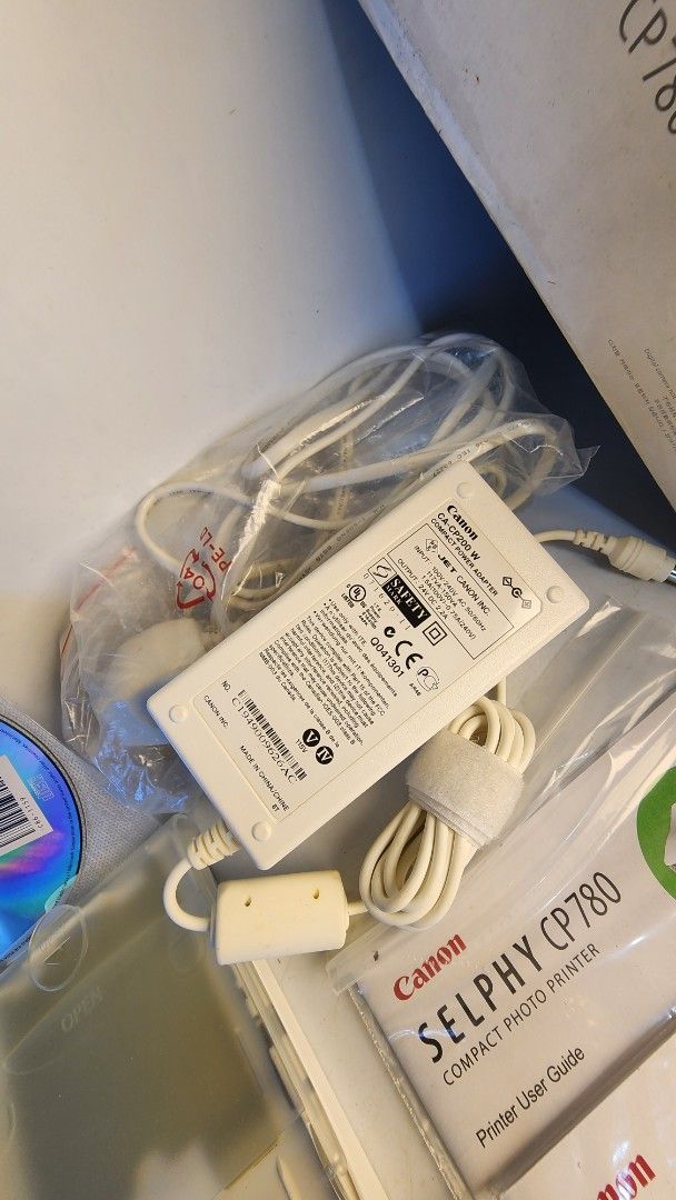 Canon SELPHY CP780 Photo Printer (Category: Printers, Scanners & Copiers) located in Baguio. Submitted by chiechie1234 (Listing ID 1438760865, Image 3). Description: - Canon SELPHY CP780 photo printer - Includes original box, power adapter, and manuals - Comes with CD-ROM and print cartridge trays - White color - Perfect for instant prints.