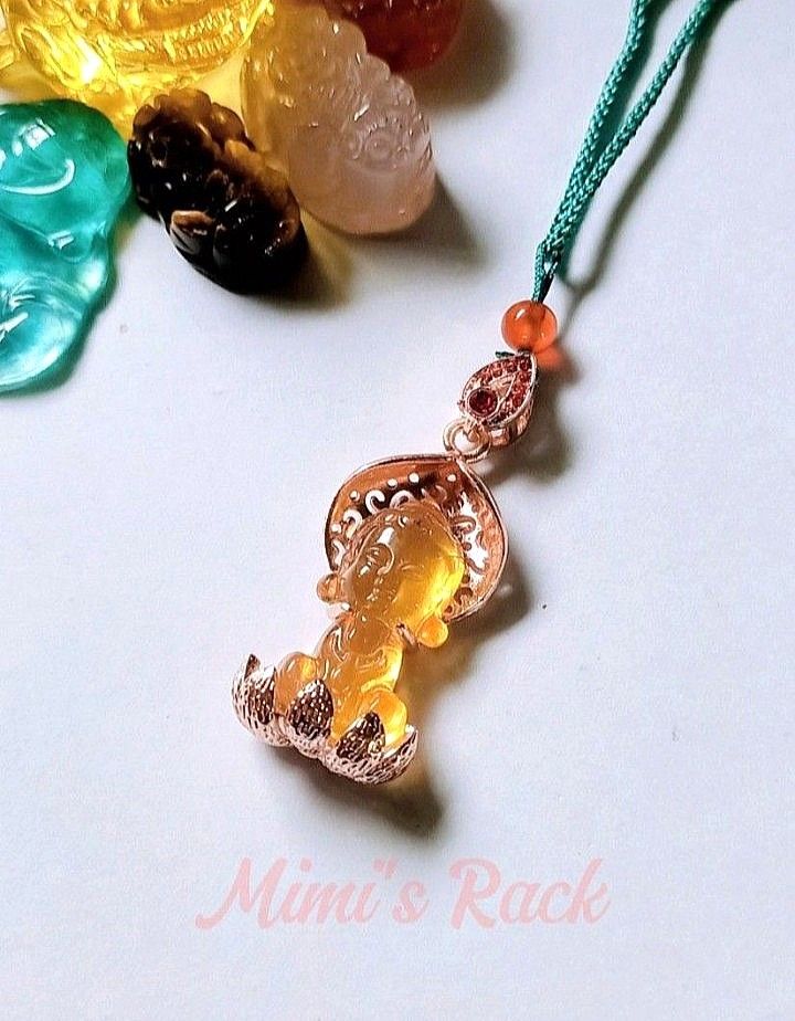 CITRINE LIULI BABY BUDDHA SITTING ON LOTUS ROSE GOLD SETTING ROPE NECKLACE (Category: Necklaces) located in Taguig. Submitted by mimisrack (Listing ID 1438849033, Image 2). Description: 💛"A sacred charm for joy, abundance, and gentle spiritual protection." -Citrine is known as the stone of abundance and positive energy -Baby Buddha symbolizes innocence, peace, and joyful blessings -Lotus represents purity, growth, and spiritual awakening -Rose g