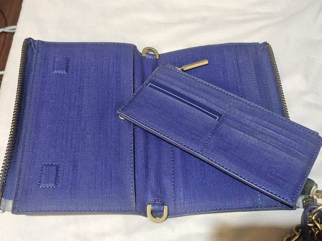 Dagne Dover Clutch Wallet with 2 straps (Category: Wallets & Card holders) located in Marikina City. Submitted by silverwind_62cbd6 (Listing ID 1438852351, Image 3). Description: The OG Dagne Dover Clutch Wallet includes 2 straps: 1 long chain strap in brushed yellow gold and 1 wrist strap comes with its original dust bag. (need to wash it first though 😬) still in good condition with flaws on the part where the clutch folds. The magnet on the de