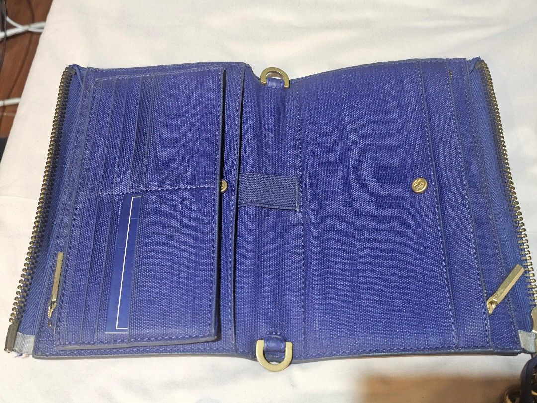 Dagne Dover Clutch Wallet with 2 straps (Category: Wallets & Card holders) located in Marikina City. Submitted by silverwind_62cbd6 (Listing ID 1438852351, Image 2). Description: The OG Dagne Dover Clutch Wallet includes 2 straps: 1 long chain strap in brushed yellow gold and 1 wrist strap comes with its original dust bag. (need to wash it first though 😬) still in good condition with flaws on the part where the clutch folds. The magnet on the de