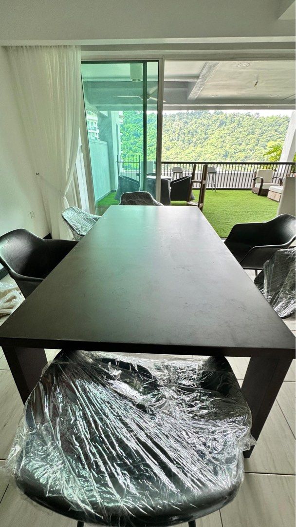 Dark Brown Rectangular Dining Table (Category: Tables & Sets) located in Kuala Lumpur. Submitted by theemir (Listing ID 1438841539, Image 3). Description: Imported and original price rm5k Arrange own pickup at Armanee Terrace Condo, Damansara Perdana - Dark brown rectangular dining table - Solid and sturdy wooden construction - Features thick legs for stability - Suitable for dining areas - Accommodates multiple chairs (6) - Chairs not included.