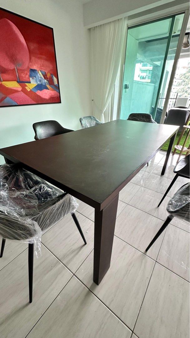 Dark Brown Rectangular Dining Table (Category: Tables & Sets) located in Kuala Lumpur. Submitted by theemir (Listing ID 1438841539, Image 2). Description: Imported and original price rm5k Arrange own pickup at Armanee Terrace Condo, Damansara Perdana - Dark brown rectangular dining table - Solid and sturdy wooden construction - Features thick legs for stability - Suitable for dining areas - Accommodates multiple chairs (6) - Chairs not included.