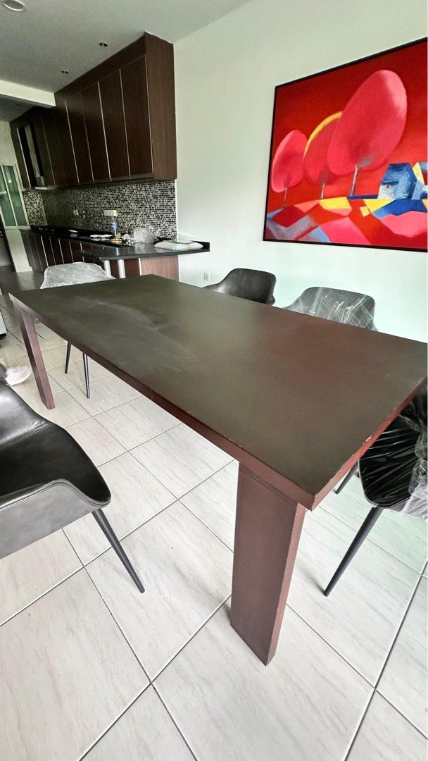 Dark Brown Rectangular Dining Table (Category: Tables & Sets) located in Kuala Lumpur. Submitted by theemir (Listing ID 1438841539, Image 1). Description: Imported and original price rm5k Arrange own pickup at Armanee Terrace Condo, Damansara Perdana - Dark brown rectangular dining table - Solid and sturdy wooden construction - Features thick legs for stability - Suitable for dining areas - Accommodates multiple chairs (6) - Chairs not included.