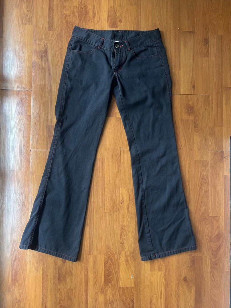 Dickies Black Flare Bootcut Pants with Red Contrast Stitching (Category: Jeans) located in Lipa City. Submitted by alexcollectionco (Listing ID 1438832499, Image 1). Description: Vintage Dickies black flare pants featuring striking red contrast stitching and a classic bootcut silhouette. These low-to-mid rise archival utility trousers perfectly channel the Y2K cyber grunge and indie sleaze aesthetic. Key Features • Brand: Dickies • Color: Faded b