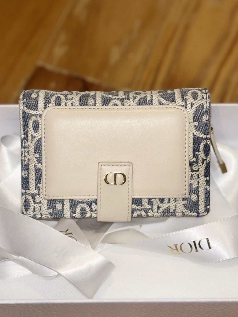 Dior 30 Montaigne Dittany Wallet (Category: Luxury Bags & Wallets) located in Taguig. Submitted by charlenelouis (Listing ID 1438770085, Image 2). Description: Main materials: Cotton, calfskin, technical fabrics Calfskin and technical fabric lining CD signature on the front Front slip pocket x1 Card slots x7 Banknote compartment x1 Double compartment with zipper x1 Slip pocket x1 Made in Italy Comes with: Dior paper bag Dior box Receipt (bought i