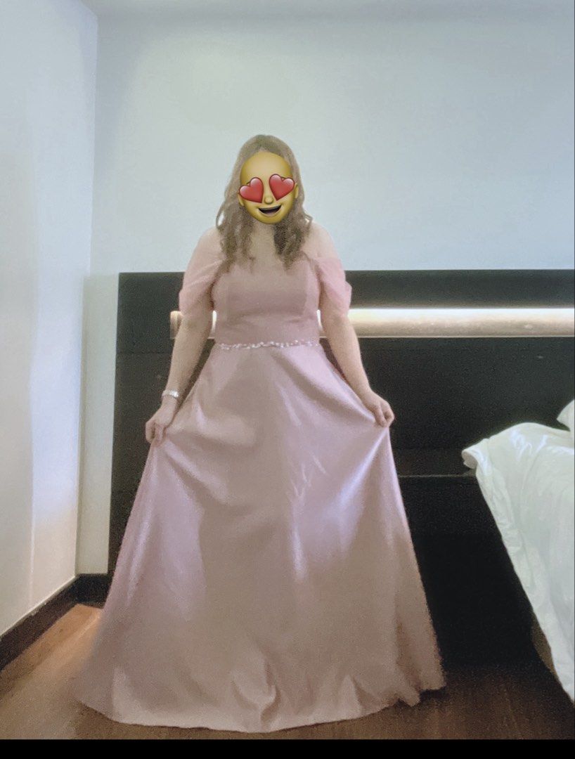 Dusty Pink Off-Shoulder Gown (Category: Evening dresses & gowns) located in Quezon City. Submitted by fly29 (Listing ID 1438766106, Image 2). Description: - Elegant pink formal gown - Off-shoulder design - Fitted bodice - Flowing skirt - Delicate beaded belt - Floor-length - Made of satin-like material - Perfect for special occasions.