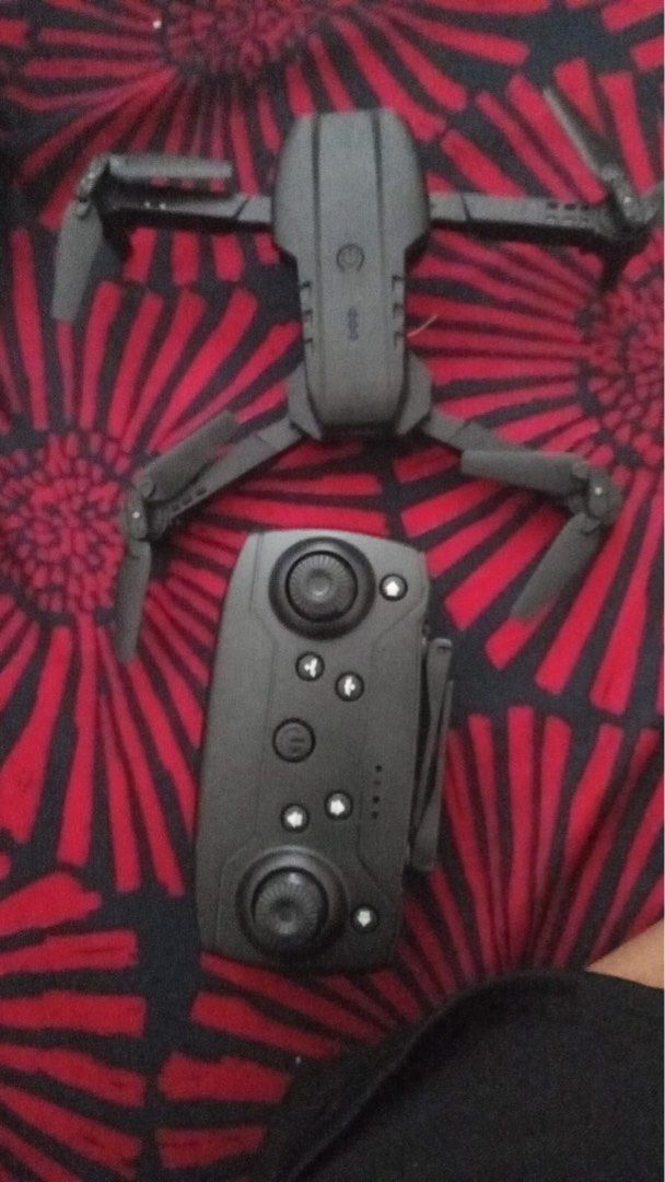 E88 Mini Drone HD Dual Camera (Category: Drones) located in Singapore. Submitted by silentphoenix-75c0 (Listing ID 1438816510, Image 2). Description: - E88 Mini Drone with dual 4K HD cameras - Stable hover function - 5G HD image transmission - Long-lasting, large capacity battery - Foldable and portable design - Phone control - Headless mode for easy flying - One-clip return feature - Lightweight: under 150g.