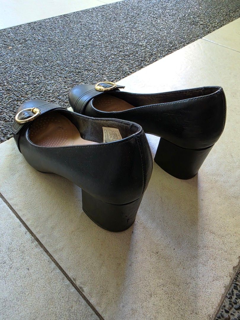 Fioni Black Heels (Category: Heels) located in Quezon City. Submitted by highonspotlight (Listing ID 1438878315, Image 3). Description: - Fioni black heels - Size 5.5 - Buckle detail - Block heel - Versatile for casual and formal events.