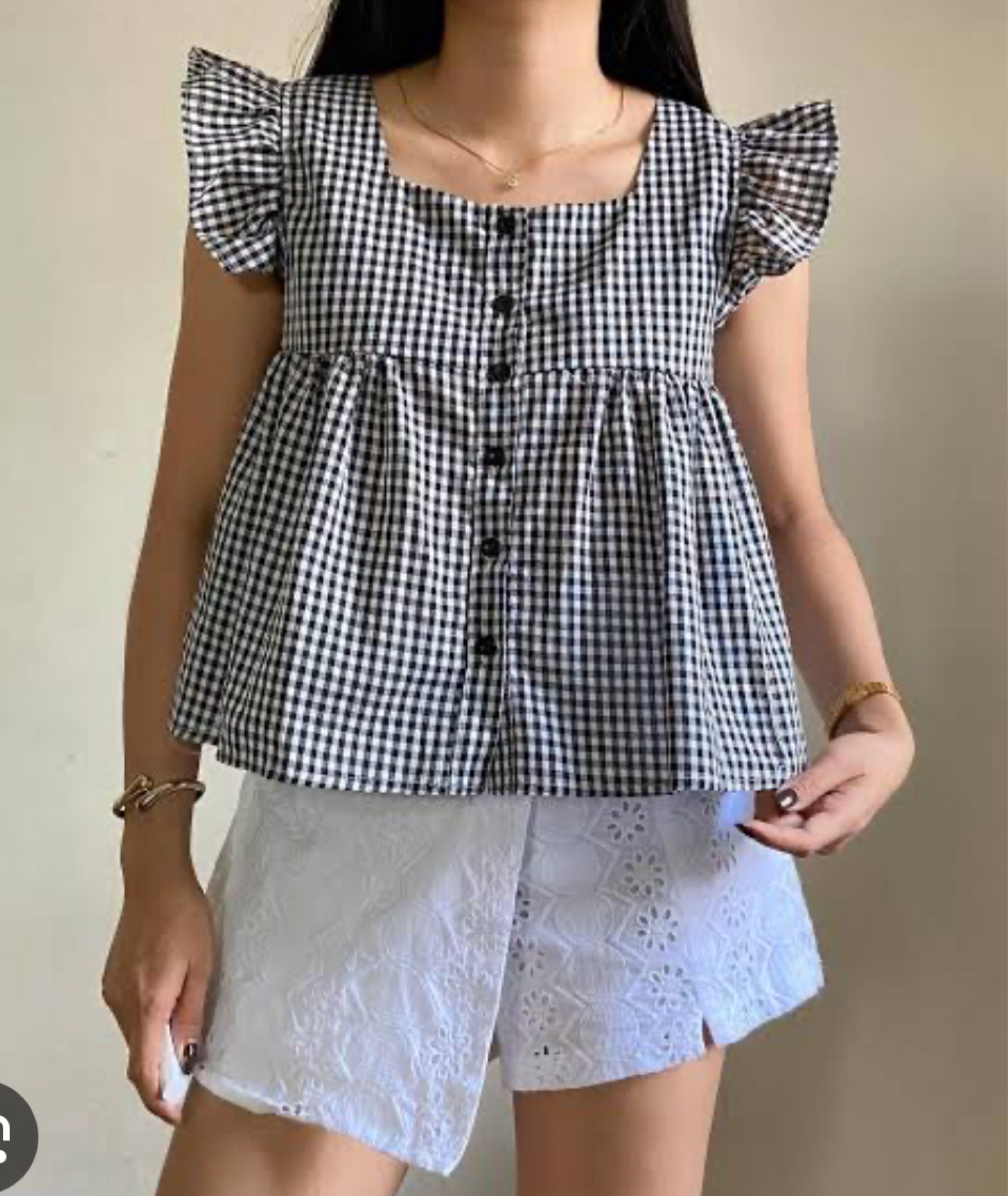 Gingham Checkered Ruffle Top (Category: Sleeveless) located in Manila. Submitted by kat_declutter (Listing ID 1438741835, Image 1). Description: -photos are not mine. CTTO. just got it for buyer’s reference - Classic gingham checkered pattern - Square neckline - Button-down front - Ruffle sleeves - Gathered waist - Criss-cross strap back - Flattering fit - Chic and stylish.