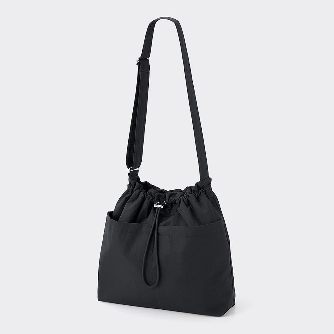 [GU Japan by Uniqlo] Black Drawstring Shoulder Bag (Category: Shoulder Bags) located in Muntinlupa City. Submitted by from_arcus (Listing ID 1438844310, Image 1). Description: - Bought from GU Ueno, Tokyo, Japan - Shoulder bag with drawstring closure - Adjustable strap for comfortable wear - Two exterior pockets - Available color: Black - Lightweight material - Simple and versatile design - Perfect for everyday use.