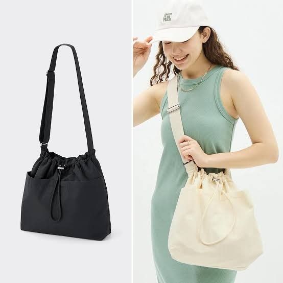 [GU Japan by Uniqlo] Black Drawstring Shoulder Bag (Category: Shoulder Bags) located in Muntinlupa City. Submitted by from_arcus (Listing ID 1438844310, Image 2). Description: - Bought from GU Ueno, Tokyo, Japan - Shoulder bag with drawstring closure - Adjustable strap for comfortable wear - Two exterior pockets - Available color: Black - Lightweight material - Simple and versatile design - Perfect for everyday use.