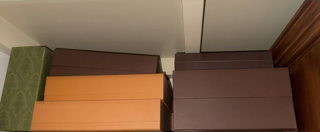 Gucci and LV boxes with dust bags (Category: Storage Boxes & Baskets) located in Manila. Submitted by kennethpam82250 (Listing ID 1438838951, Image 1). Description: - Set of assorted storage boxes - Colors: Brown, orange, and green - Various sizes and shapes - Ideal for organizing shelves and storage - Helps declutter and keep your space tidy.