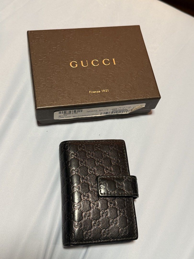 Gucci Microguccissima Card Case (Category: Luxury Bags & Wallets) located in Quezon City. Submitted by edward282 (Listing ID 1438877955, Image 1). Description: - Authentic Gucci card case - Signature Microguccissima pattern - Multiple card slots - Snap closure - Includes original box - Shows wear along the edges - Box features Gucci logo and "Firenze 1921".