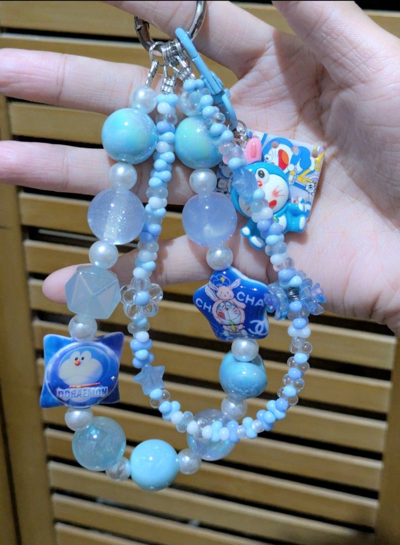 Handmade Doraemon Beaded Phone Charm Strap Bag Charm Keychain (Category: Character Goods) located in Batangas. Submitted by mirajane._ (Listing ID 1438875841, Image 2). Description: Doraemon Handmade Phone Charm, Bag Charm Accessory Anik-Anik - Brand new & handmade by me! ✨ - Hand crafted - Adorable Doraemon keychain - Comes with a clear phone lanyard tab - Perfect for bags and phones 🤍 MOP: GCash only MOD: J&T Pay as you order. No Reservations 