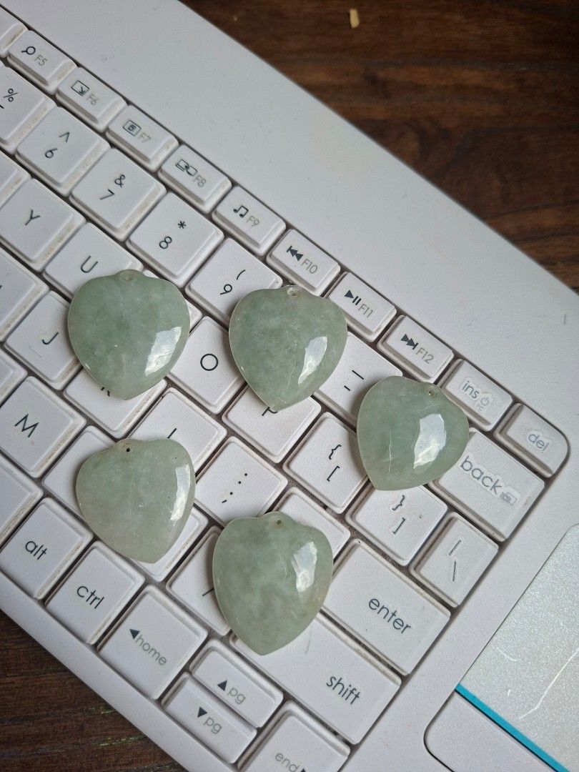 Heirloom Jadeite Jade Heart Pendant (Category: Necklaces) located in Calamba. Submitted by mariacarme86067 (Listing ID 1438728765, Image 2). Description: Heirloom Jadeite Jade Heart Pedant for Sale The first 2 photos show the exact same 5 pendants. The green color pops out depending on the light and background. Selling these for 1000 each Last photo is from a previous client. The gold necklace is hers. Ships from Nuvali via LBC.