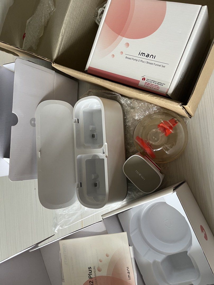 Imani i2 Plus Breast Pump Set (Category: Breastfeeding & Bottle Feeding) located in Mandaluyong City. Submitted by gcr389 (Listing ID 1438697846, Image 2). Description: - Includes pump, breast funnels, and accessories - Comes with user manual and original packaging - Includes charging cable - will need new cups. Has some new replacement parts/flanges included. - Working properly but one pump has loose bits inside from being dropped hence selling 