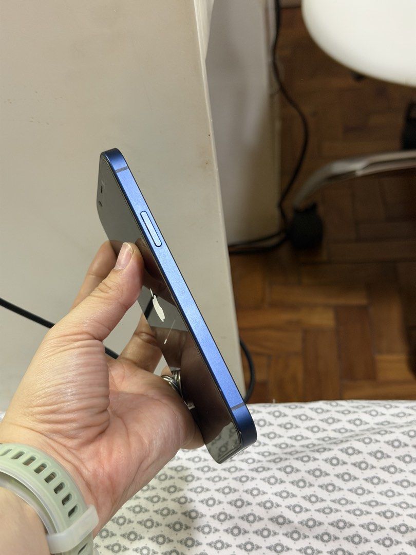 iPhone 12 64gb Blue (Category: iPhone 12 Series) located in Marikina City. Submitted by isaygarcia (Listing ID 1438809847, Image 3). Description: Battery health: 79% With original cord (used) Open line Minimal scratches.