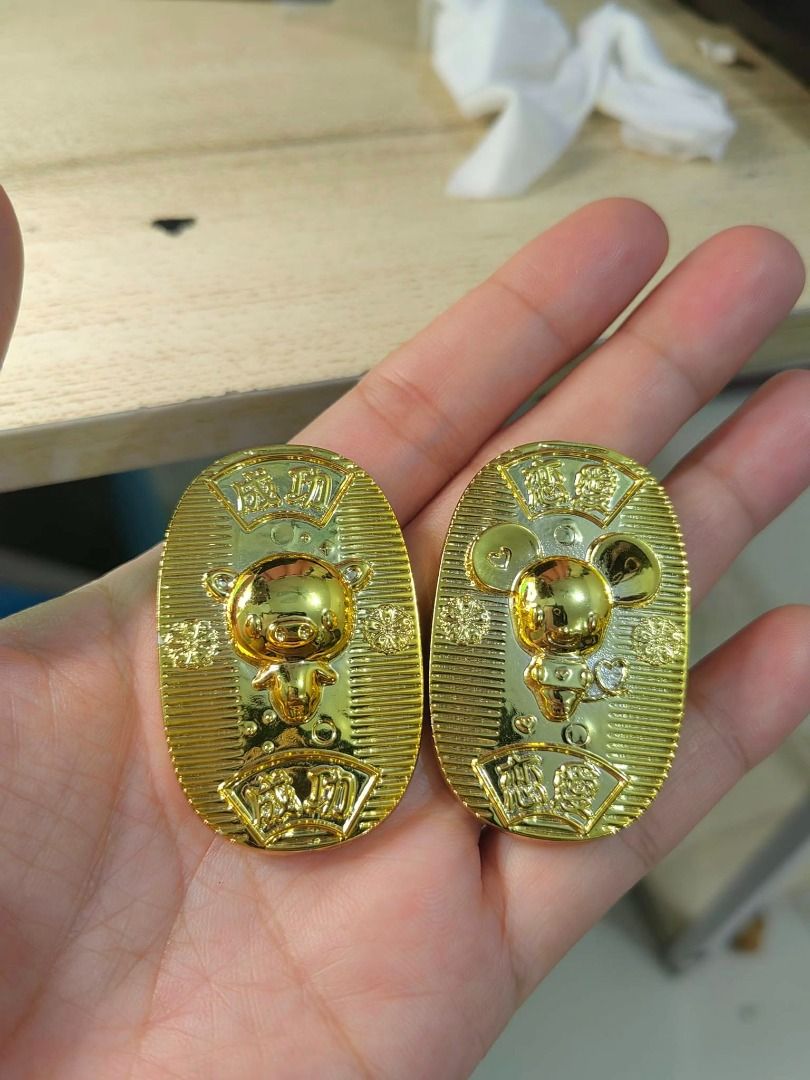 Japanese-style lucky charm (Category: Other Accessories) located in Cebu City. Submitted by dudes_villanueva (Listing ID 1438795088, Image 3). Description: Japanese-style lucky charm 📌 modeled after a traditional Koban (oval gold coin). It is embossed with a stylized character resembling a bear and mouse, inscribed with specific text to invite good fortune..