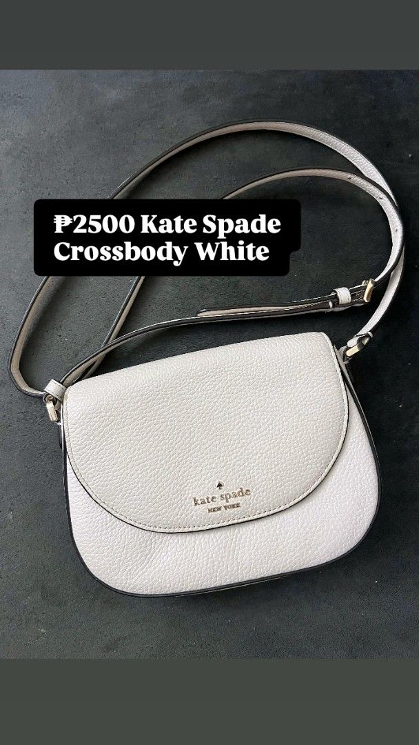 Kate Spade Crossbody White Bag (Category: Cross-body Bags) located in Taguig. Submitted by andrenalin (Listing ID 1438784246, Image 1). Description: - White Kate Spade crossbody bag - Flap closure - Adjustable strap - Kate Spade logo detail - Versatile for everyday use - Classic design.