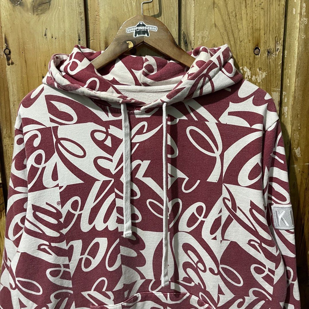 Kith x Coca Cola Cubed Global Hoodie (Category: Coats, Jackets and Outerwear) located in Baguio. Submitted by goodfinds2600v2 (Listing ID 1438847523, Image 2). Description: Size on tag: M Dimensions: L- 28 W- 22.5 Description: Unisex Condition: Very Good Issue/s: faded on some parts .