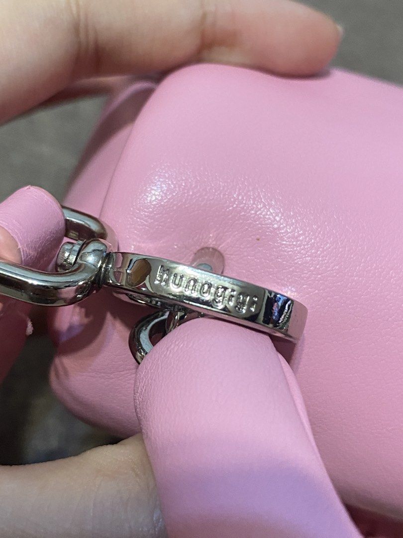 Kunogigi Pink Pigpig hand bag (Category: Tote Bags) located in Calamba. Submitted by jupreloved_ (Listing ID 1438731847, Image 3). Description: Pink Kunogigi handbag. Features a top handle, detachable shoulder strap, and unique clasp closure. Interior is pink. Brand: Kunogigi Size: Small Shipping through J&T. Payment are strictly through GCASH only, no COD. Exact size and color may be different from the picture. This is a preloved item, please ma