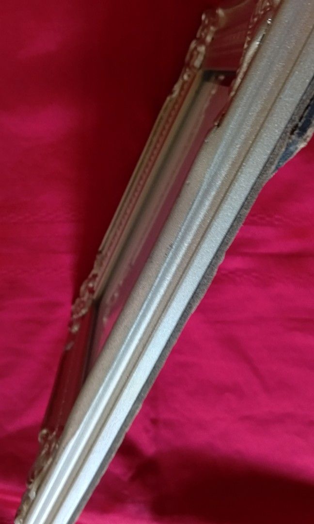 Large Sized Wooden Frame in Silver Color (Category: Frames & Pictures) located in Quezon City. Submitted by jojoleen28 (Listing ID 1438724454, Image 3). Description: Frame 21cm x 26cm Fits photo 14cm x 19cm Beautiful design; has chip in one corner as seen in last photo; cardboard back shows signs of ware..