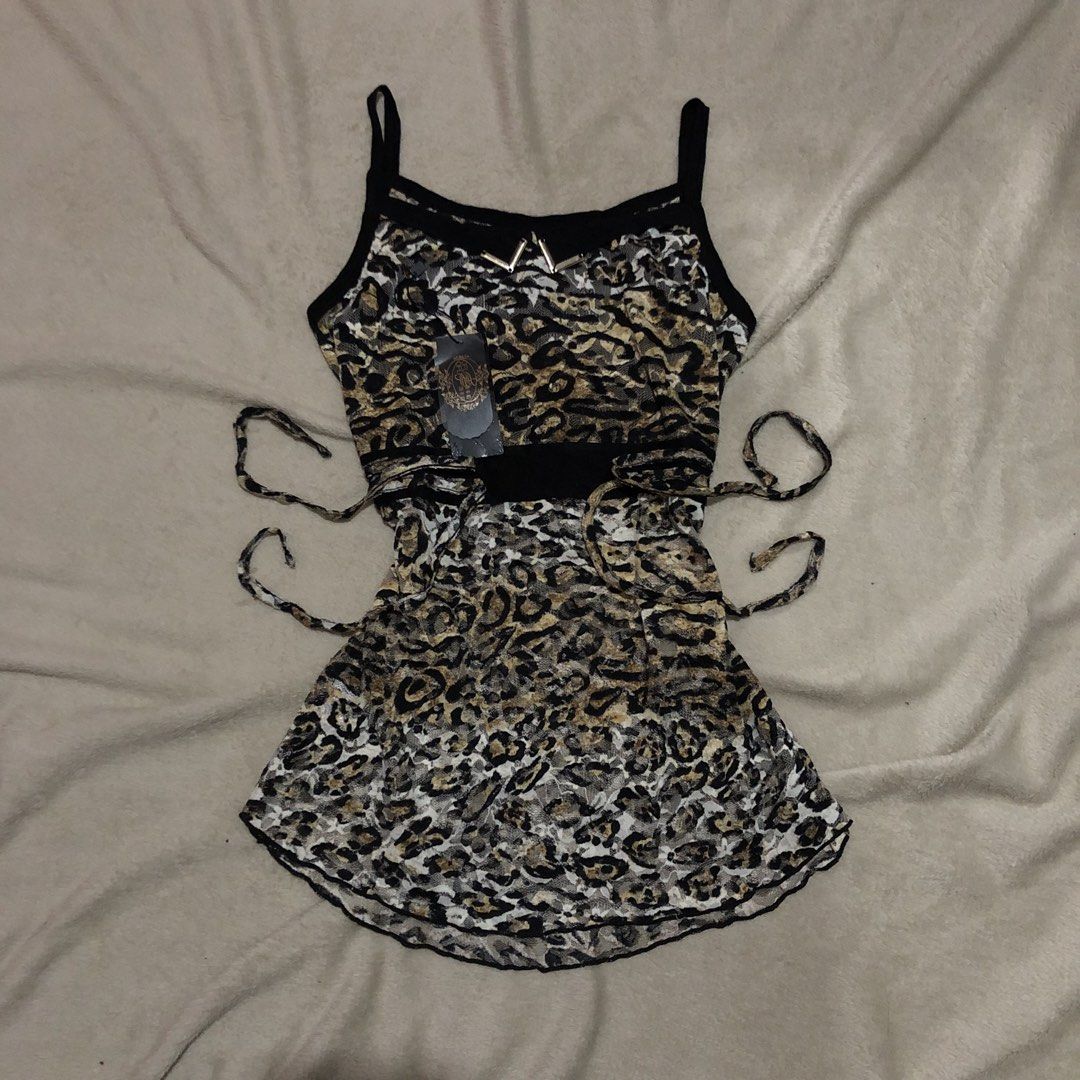 Leopard Print with Side Ties (Category: Sleeveless) located in Manila. Submitted by theactualized (Listing ID 1438757461, Image 1). Description: .