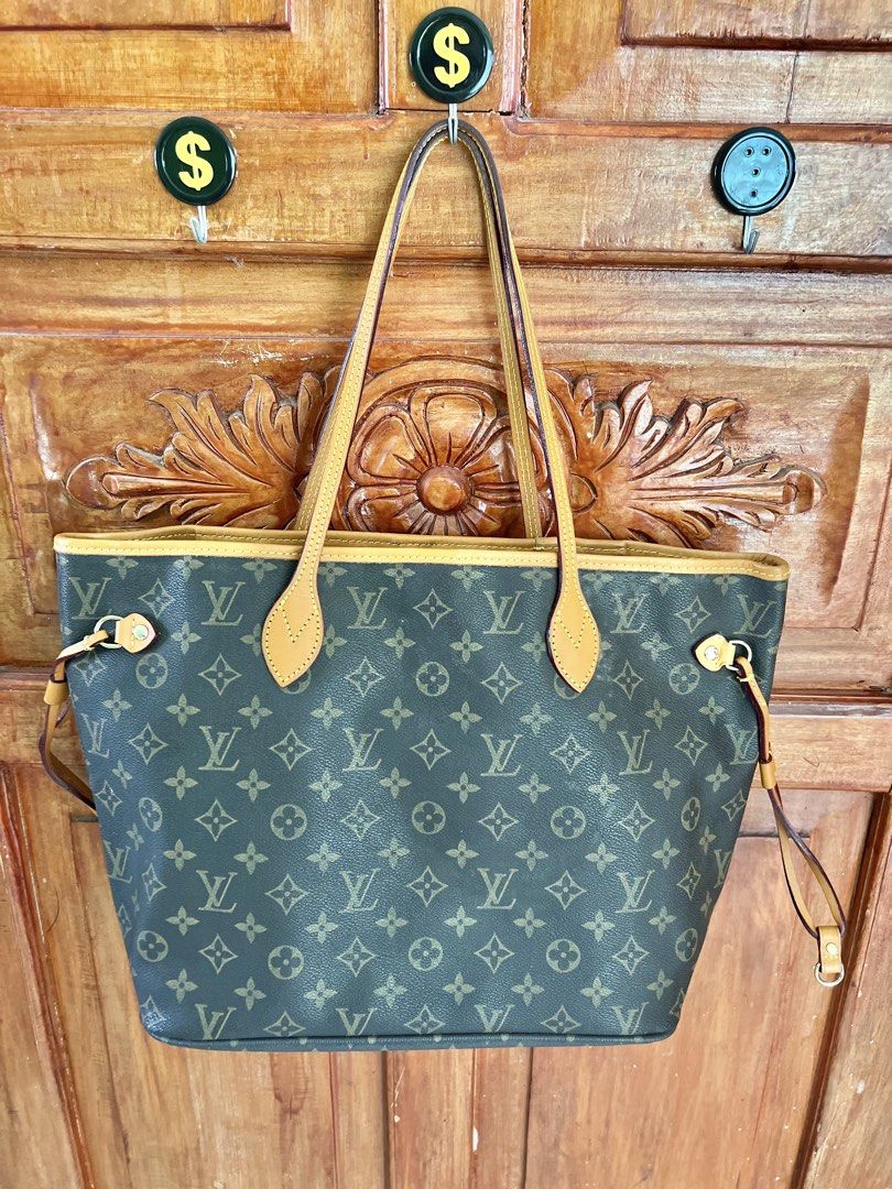 Louis Vuitton Neverfull MM Tote Bag (Category: Luxury Bags & Wallets) located in San Fernando. Submitted by prettyfinds2021 (Listing ID 1438749281, Image 1). Description: - Louis Vuitton Neverfull MM tote bag - Iconic Monogram canvas exterior - Vachetta leather trim and handles - Spacious main compartment - Interior zippered pocket - Adjustable side laces - Japan sourced.