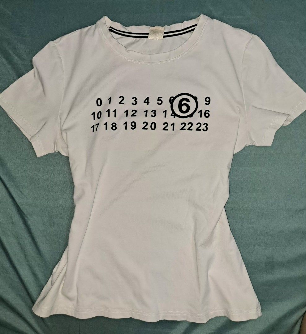 Maison Margiela Calendar tee inspired archive Basic white shirt (Category: Shirts) located in Quezon City. Submitted by madshoppe (Listing ID 1438792518, Image 1). Description: Maison Margiela calendar tee dupe perfect for denim jeans W17xL22.