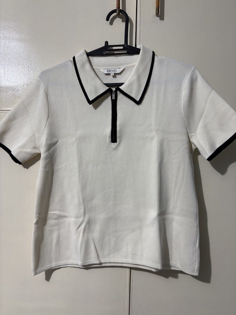 Memo White Polo Top with Black Trim Large (Category: Blouses) located in Caloocan City. Submitted by mommyk2026 (Listing ID 1438786473, Image 1). Description: Memo White Polo Top with Black Trim Large Polo shirt / blouse Collared neckline, zipper closure, short sleeves Knitted Office / Casual / Semi-formal / Business Attire Preloved, used 3x only Negotiable RFS: Decluttering Payment via Gcash/ Online bank transfer Shipped from South Caloocan Ship