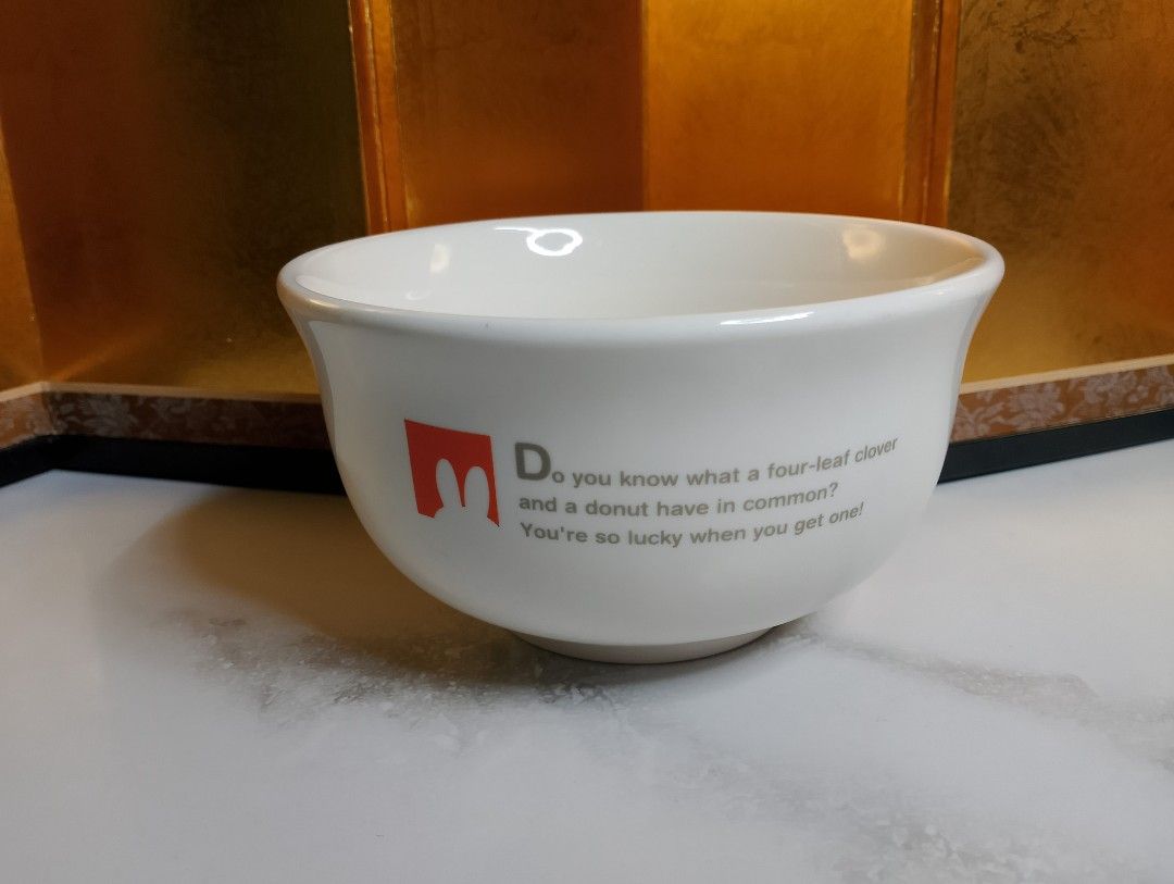Miffy x Misdo Ceramic Bowl (Category: Other Kitchenware & Tableware) located in Valenzuela. Submitted by buylaaaaa (Listing ID 1438785222, Image 2). Description: - Miffy x Misdo ceramic bowl - Features a white exterior with Miffy illustration, clover, and a quote - Bottom marked with Miffy logo and "Produced by Mister Donut" - Approximately 10cm diameter - Approximately 7cm height.
