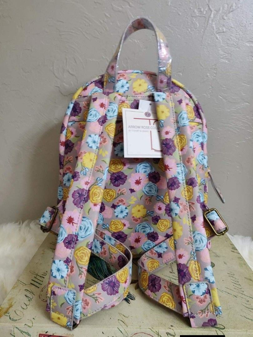 Mini Floral Backpack Purse Beige with Gray Rose Design (Category: Backpacks) located in Quezon City. Submitted by ranielafinds (Listing ID 1438840455, Image 3). Description: Brand new / US-bought item Features: • Mini backpack purse • Beige color with gray floral/rose design • Front zip pocket • Made with PETA-certified cruelty-free vegan materials • Lightweight and stylish design Perfect for casual outings and everyday use 👍🏻.