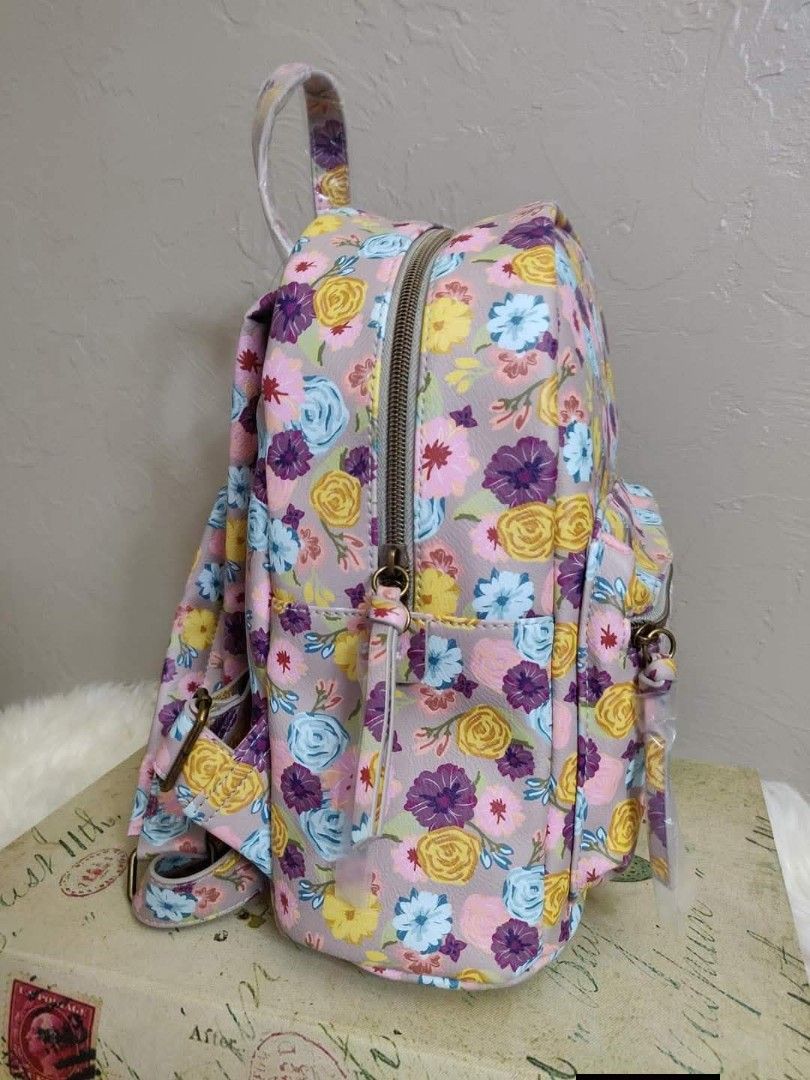 Mini Floral Backpack Purse Beige with Gray Rose Design (Category: Backpacks) located in Quezon City. Submitted by ranielafinds (Listing ID 1438840455, Image 2). Description: Brand new / US-bought item Features: • Mini backpack purse • Beige color with gray floral/rose design • Front zip pocket • Made with PETA-certified cruelty-free vegan materials • Lightweight and stylish design Perfect for casual outings and everyday use 👍🏻.