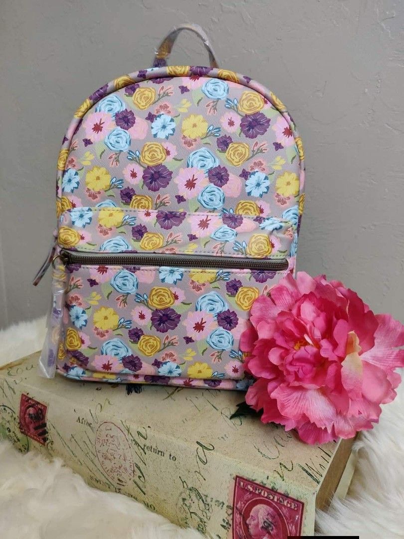Mini Floral Backpack Purse Beige with Gray Rose Design (Category: Backpacks) located in Quezon City. Submitted by ranielafinds (Listing ID 1438840455, Image 1). Description: Brand new / US-bought item Features: • Mini backpack purse • Beige color with gray floral/rose design • Front zip pocket • Made with PETA-certified cruelty-free vegan materials • Lightweight and stylish design Perfect for casual outings and everyday use 👍🏻.