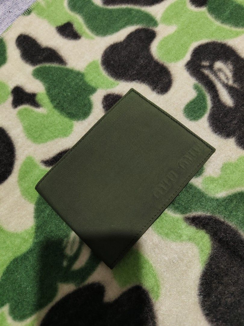 MIU MIU WALLET ARMY GREEN (Category: Luxury Bags & Wallets) located in Baguio. Submitted by igorotak.111.taraki.com (Listing ID 1438846799, Image 1). Description: FS AUTHENTIC MIU MIU WALLET ARMY GREEN V GOOD CONDI NO ISSUES MADE IN ITALY LAMPO ZIPPED SOLID NITO ♥️.