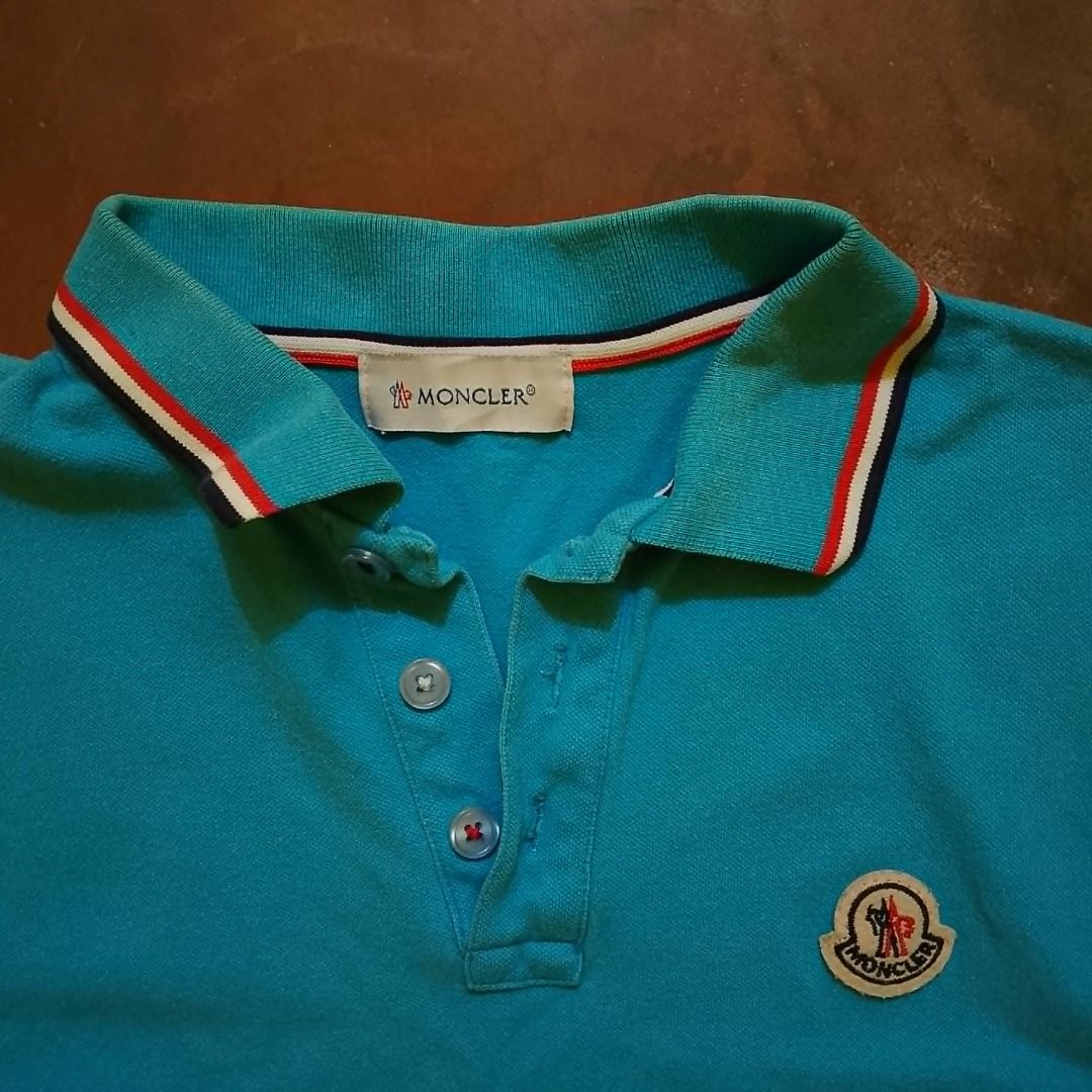 Moncler Polo Shirt - Sky Blue (Category: Shirts) located in Cagayan de Oro. Submitted by drp.central (Listing ID 1438863118, Image 2). Description: Moncler Polo Shirt - Sky Blue Dimes: W - 17" L - 23" Color: Sky Blue Complete tags ✅ Color Rate: 9/10 Condition: 9/10 Issue: Discoloration line in the collar part No return/ refund Can ship using J&t 🏷️- P250 +sf.