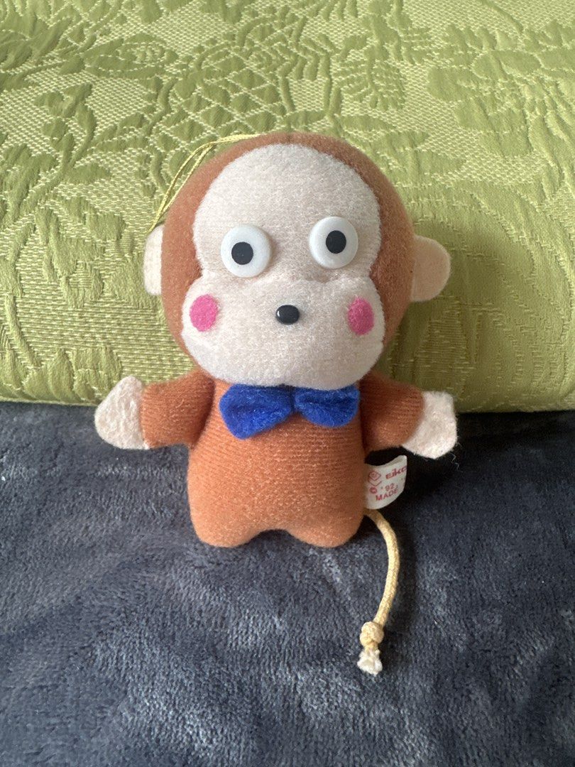 Monkichi the monkey (Category: Toys & Games) located in Cainta. Submitted by shopbyyna (Listing ID 1438713849, Image 1). Description: - Vintage Eiko monkey plush toy - Features: - Brown body - White face - Blue bow tie - Pink bottom - Long tail - Includes hanging string - Made in China, 1992 - Perfect for collectors and gifts.
