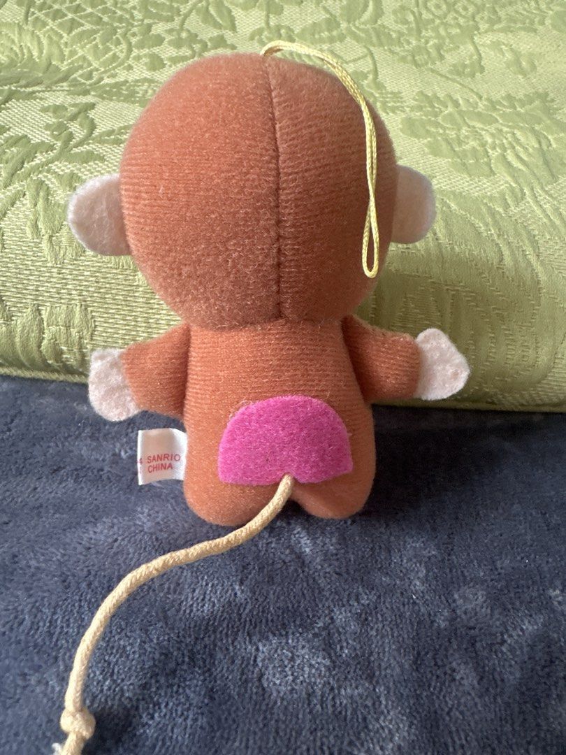 Monkichi the monkey (Category: Toys & Games) located in Cainta. Submitted by shopbyyna (Listing ID 1438713849, Image 2). Description: - Vintage Eiko monkey plush toy - Features: - Brown body - White face - Blue bow tie - Pink bottom - Long tail - Includes hanging string - Made in China, 1992 - Perfect for collectors and gifts.