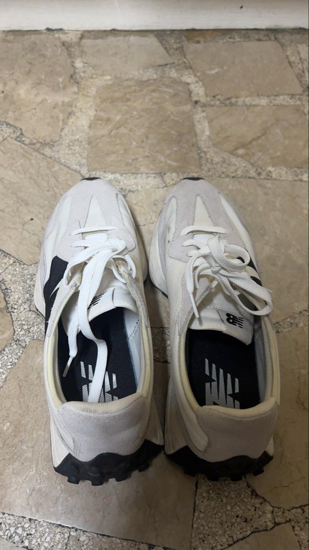 New Balance 327 White Sneakers (Category: Sneakers) located in Manila. Submitted by helzn (Listing ID 1438745125, Image 3). Description: - LOWEST PRICE: New Balance 327 sneakers, just needs cleaning - Color: White with black accents - Features the oversized 'N' logo - Black, textured soles - White laces and padded collar - New Balance logo on insoles.