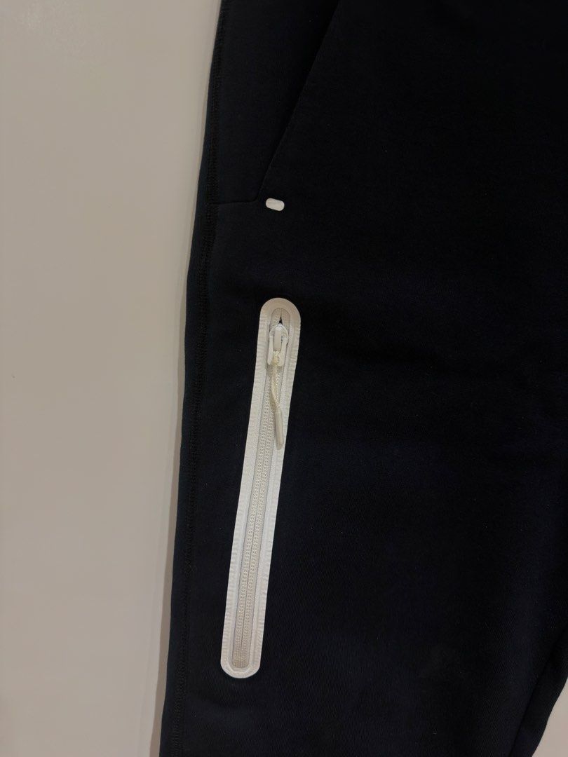 Nike Tech Fleece Joggers (Category: Joggers) located in Makati City. Submitted by delr2191 (Listing ID 1438743084, Image 3). Description: - Nike Tech Fleece pants - Color: Black - Size: Small (S) runs small - Features: White Nike logo, zippered side pocket, drawstring waistband - Made in Vietnam Used lightly.