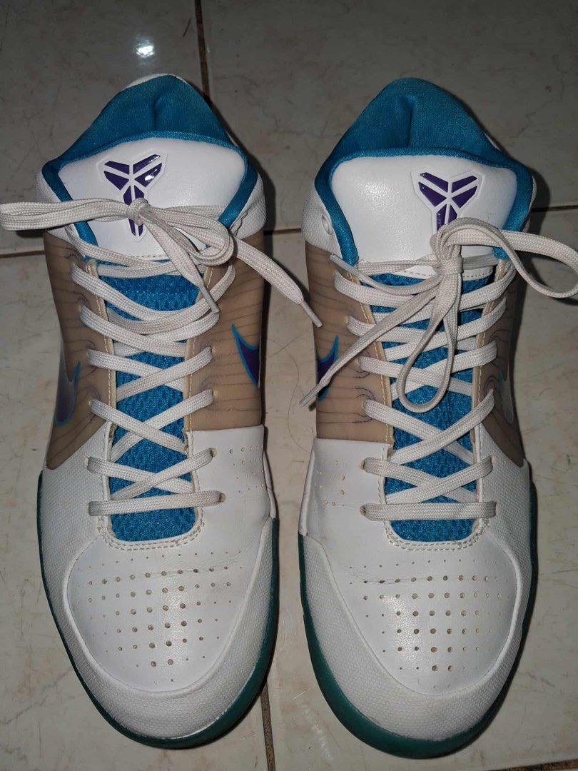 Nike Zoom Kobe IV 4 Draft Day Hornets (Category: Sneakers) located in Manila. Submitted by adoboaddict362 (Listing ID 1438825439, Image 2). Description: - Nike Zoom Kobe IV 4 sneakers - Color scheme: White, teal, and purple - Details on the back: "6.26.96" and "24" - Purple Nike Swoosh No Original Laces And No Original Box .
