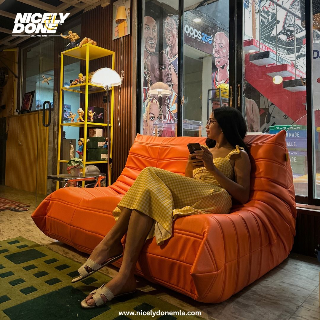 Orange Togo Sofa (Category: Sofas) located in Manila. Submitted by nicelydone31948 (Listing ID 1438733116, Image 3). Description: Stylish orange Togo sofa. Modern design, low profile, and durable material. Adds a pop of color to your living space. Perfect for lounging..
