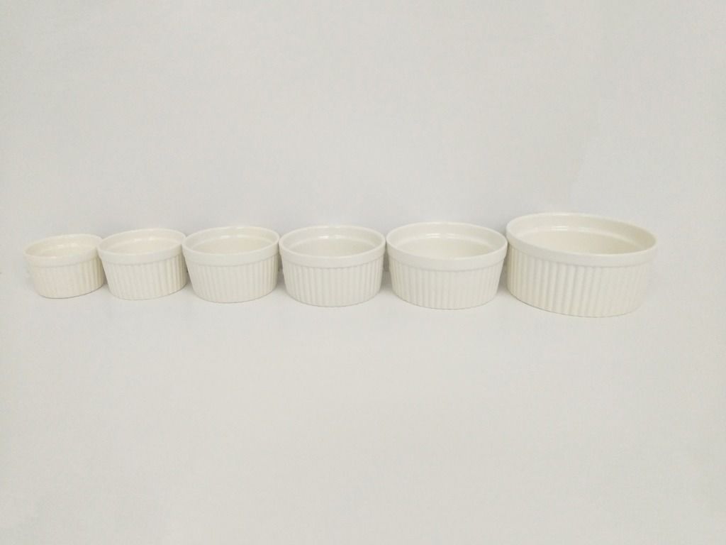 Ramekin Ceramic Souffle Cup Bowl 7 Sizes (Category: Bakeware) located in Quezon City. Submitted by inter_active_megawares (Listing ID 1438746059, Image 1). Description: Ramekin Ceramic Souffle Cup Bowl 7 Sizes IA2602-010 - Extra Extra Small Price: P25.00 Weight: 70g Diameter: 6.3cm Height: 3.8cm Volume: 60ml Capacity IA2602-006 - Extra Small Price: P30.00 Weight: 85g Diameter: 7cm Height: 4.1cm Volume: 80ml Capacity IA2404-271 - Small Price: P35.