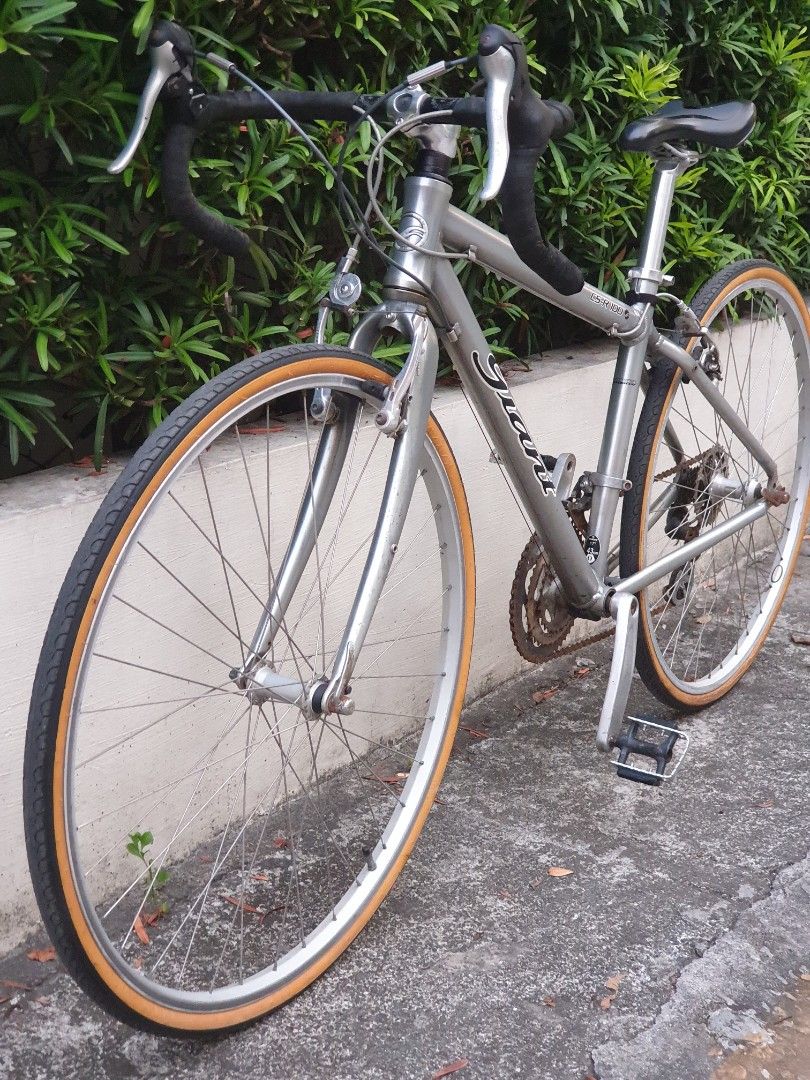 Rare Retro GIANT CS-R100 700c (Category: Bicycles) located in Las Pinas. Submitted by oldsthetics (Listing ID 1436649573, Image 3). Description: Something retro for a project bike? Test ride and negotiate Letting go of this Rare Retro GIANT CS-R100 On it's Old Retro Giant Logo 700c Aluxx frame SS 43 / TT 53 Shimano Sora Flightdeck Shimano Acera 3x8 Tektro Travel Agent V-brakes Need to refresh/restore Running condition Lost time to use it regularl