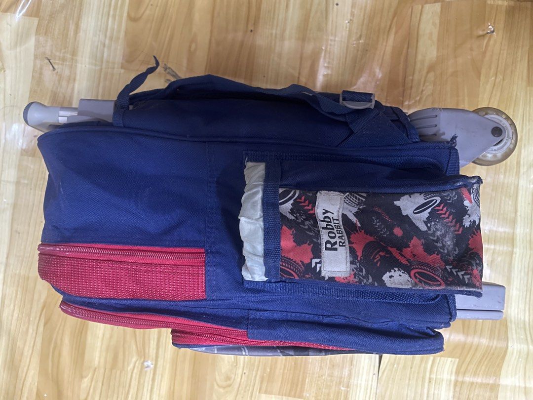 Robby rabbit trolley (Category: Babies & Kids Fashion) located in Las Pinas. Submitted by thineblyt_0120 (Listing ID 1438804739, Image 3). Description: For sale 📌 Preloved Robby Rabbit Trolley Bag ₱850 only Issue posted my gasgas po sa gilid since bata po yung gumamit ng trolley bag Need wash lang po kasi na stock Trolley Description📌 Size: 30 L X 16 W X 41 H cm 1 Lunch kit, Juicer, Rain Cover and soft Pencil Case.
