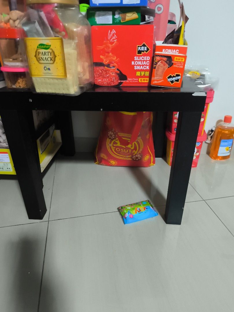 Side Table (Category: Tables & Sets) located in Singapore. Submitted by living_simple (Listing ID 1438835714, Image 2). Description: [moving out clearance]- two IKEA tables to let go. 1) white curved edge w wheels - $7 - laminate at the edges are coming apart slightly.. - one of the wheels is a little faulty in the sense that the cap keeps coming off.. can still be rolled around though replacement might be good. - still sturdy and functional.grea