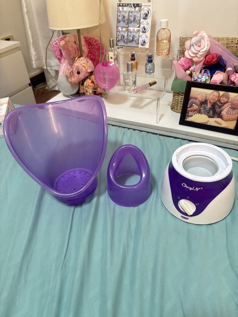 Skincare Facial Steamer (Category: Face Care) located in Pasig City. Submitted by cleaning.closet (Listing ID 1438800258, Image 2). Description: - Cheyi N facial steamer for home use - Stylish purple and white color scheme - Features a detachable nozzle - Includes a convenient water reservoir - Comes with a power cord - Adjustable steam output via dial - Device is in good working condition.